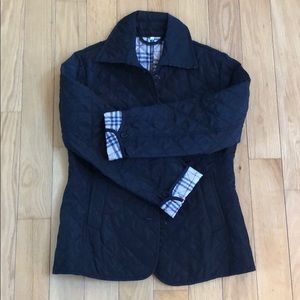 Black quilted jacket designer-like beige plaid